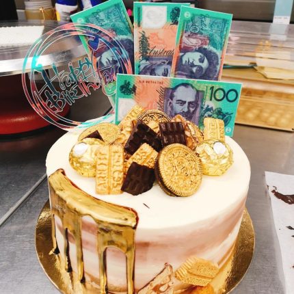 Indulge in Luxury: iCake's Golden Nugget Money Cake Delights!