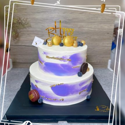 Elegant Purple and White Macarons: Indulge in Delicate Delights from iCake!