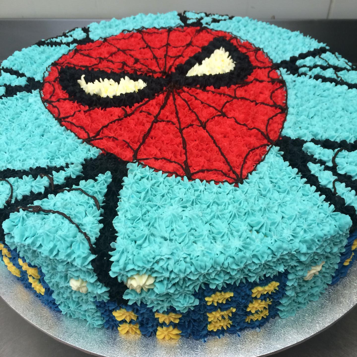 Spiderman cake made from buttercream with fondant and chocolate accents -  by Cake Occasion | Spiderman birthday cake, Spiderman cake, Novelty  birthday cakes