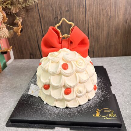 Elegance Meets Festivity: Unwrapping Joy with Our Bow Tie Christmas Tree Cake - A Stylish Slice of Holiday Cheer!