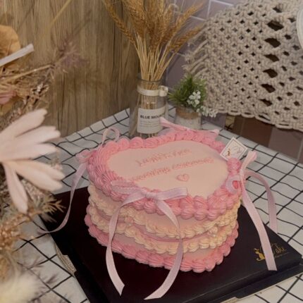 Vintage Heart-Shaped Pink Ribbon Cake - Delight in Every Slice | iCake Melbourne