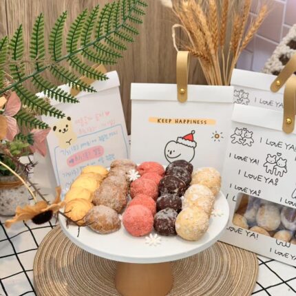 Sugar-Dusted Hazelnut Truffles – Crunchy Bites | iCake Melbourne