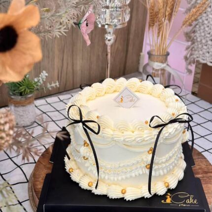 Vintage Bow Pearl Cake – Elegant Retro Birthday Cake with Gold Accents | iCake Melbourne