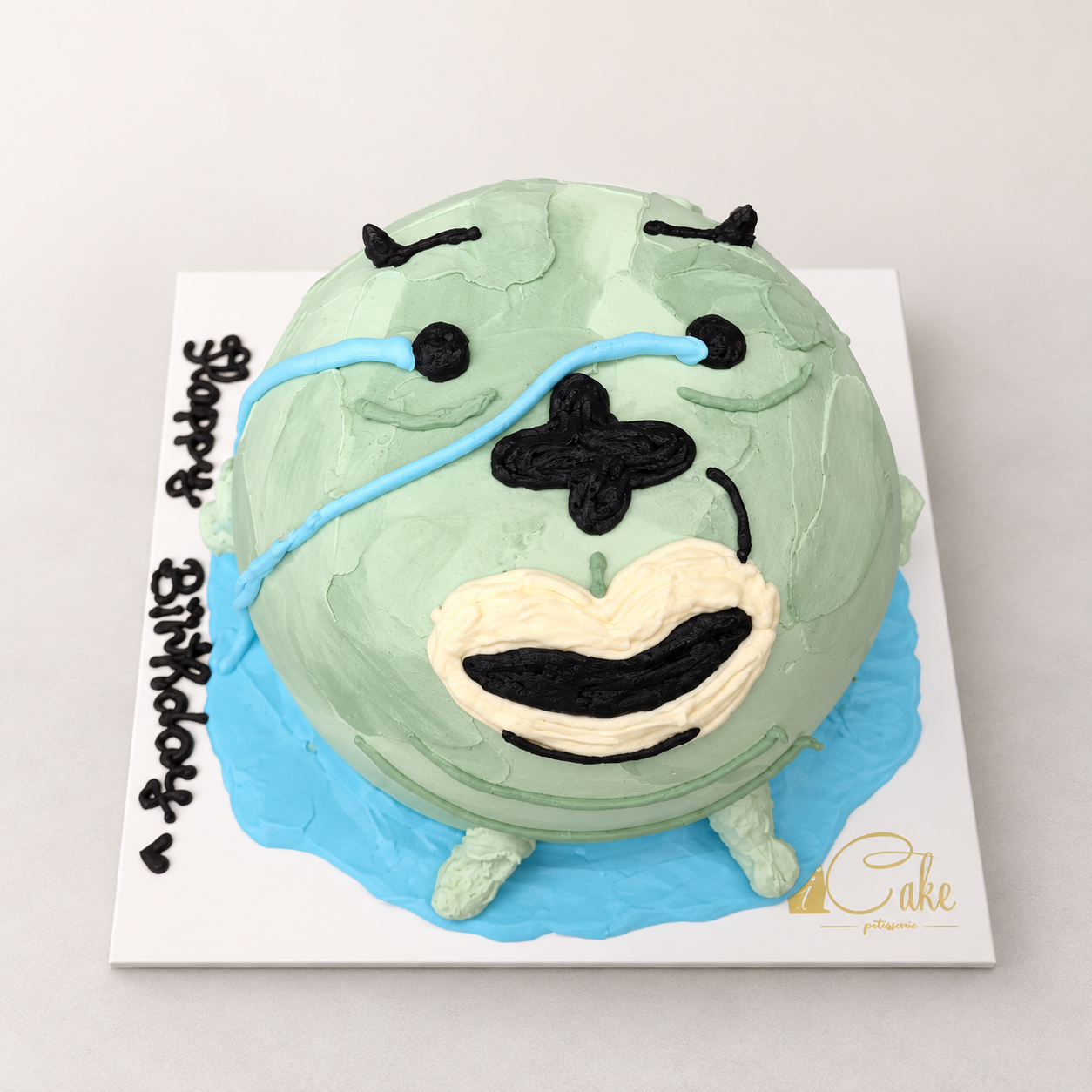 Funny Green Face Birthday Cake with mint-green icing by iCake Melbourne