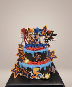 Two-tier Sonic the Hedgehog birthday cake with black icing, blue drip, character toppers and stars by iCake Melbourne